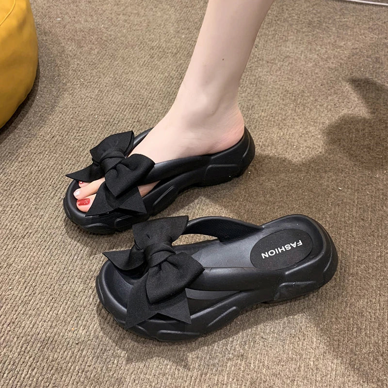 Tongs à semelle compensée avec nœud papillon pour femmes