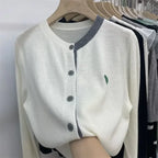 Cardigan en maille avec petit coeur