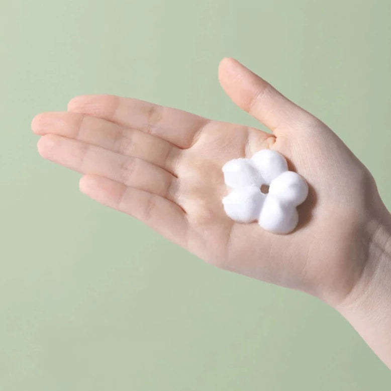 Distributeur de savon en forme de fleur